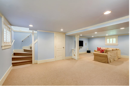 Basement newly repainted with a powder blue color. The work was done by Peintre Victoriaville.